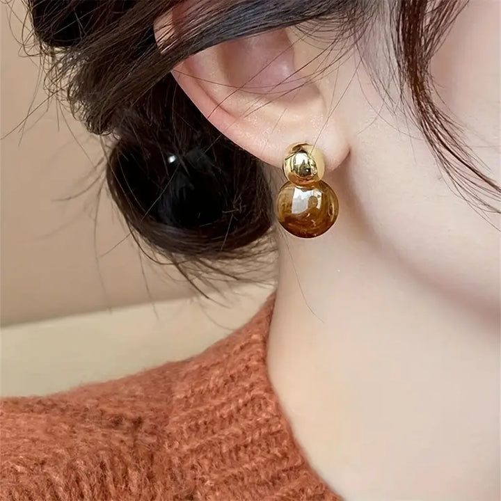Aurélie Amber Dangle Oorbellen | Goud